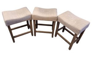 Set of 3 Beige Upholstered Counter Height Saddle Stools  Wood Frames  Nailhead Trim