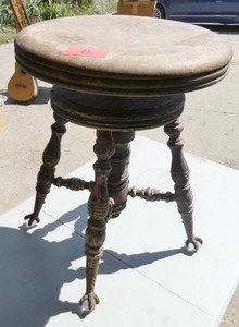 Vintage piano stool with claw and glass ball feet