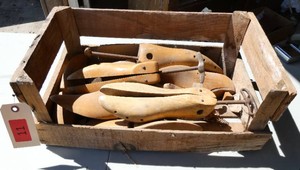 Crate full of shoe stretchers
