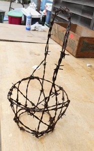 Unique vintage barbed wire basket