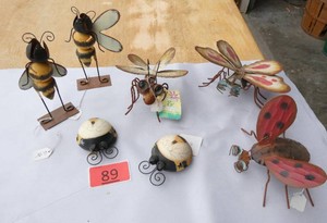 Seven fun tin bugs for your plants or garden