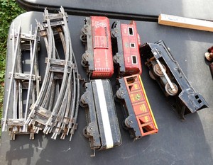 Vintage Marx tin train, engine and 4 cars, track, likely 1930s