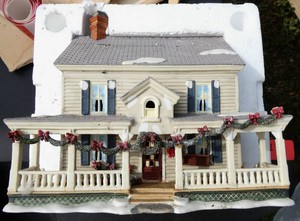 Christmas house and cobblestone street