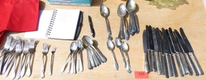 Large group of stainless silverware