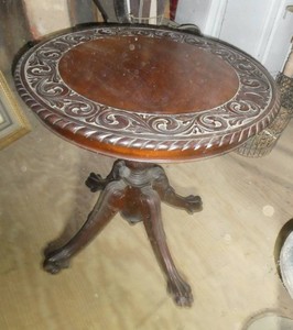 Great vintage ornate table with claw feet  Just needs a cleaning