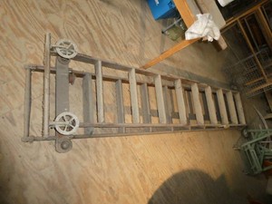 Vintage barn rolling library ladder