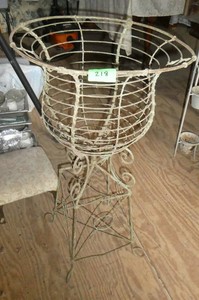 Neat Iron flower basket 3 ft tall 19 wide