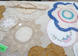 Various handmade crochet doilies