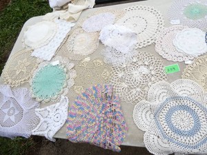 Another large group of handmade doilies