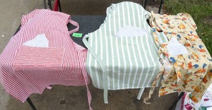 9 good lightly used aprons