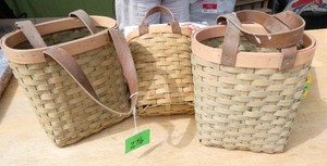 3 wicker baskets with leather handles