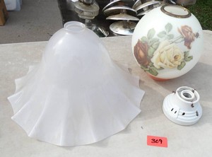 Two vintage lamp shades and a ceramic light fixture
