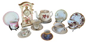 Vintage Floral Tea Cup & Saucer Collection with Teapot and Decorative Clock