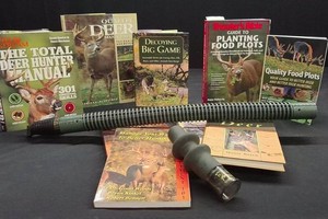 9 DEERTURKEY HUNTING BOOKS AND 2 ANIMAL CALLS