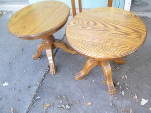 Pair of hardwood round clawfoot side tables