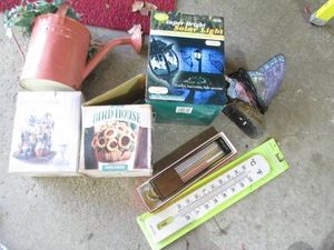 Outdoor themed sculptures, birdhouse, lamp and decor