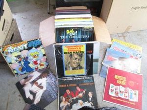 Vintage vinyl record albums from a wide variety of genres and artists including Elvis, Glenn Miller, Billy Ocean and more