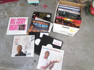 Vintage vinyl record albums from a wide variety of genres and artists including Bill Cosby, Glenn Miller, Belafonte and more