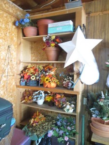 Collection of assorted season faux floral wreaths, arrangements and more
