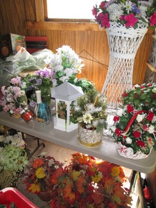 Seasonal decorative faux floral arrangements in a wide variety of colors