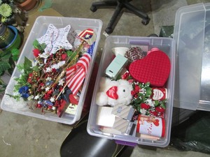 (2) shallow lidded totes containing a variety of Valentines Day and 4th of July keepsakes and decor