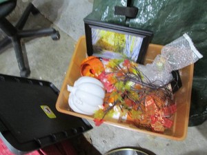 Covered Tote containing an assortment of fall related home decor and more