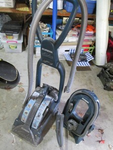 Eureka Atlantis Carpet cleaner with attachments and accessories shown