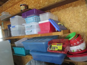 Collection of assorted empty storage containers, smaller totes, organizer organizer bins and more