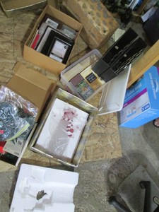 Variety of picture frames, novels, Christmas Decor and other household items