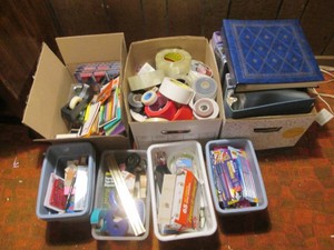 A large collection of office items including tape, pens and more