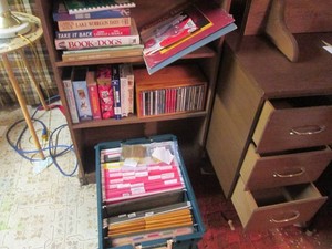 Books, CDs and VHS tapes as shown