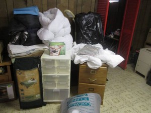 Lot of miscellaneous items including a rolling storage cart, wooden file cabinet