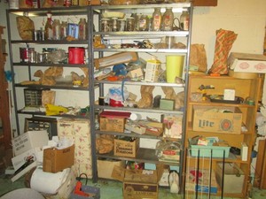 2 metal shelves and 1 wooden shelf as shown. Contents not included