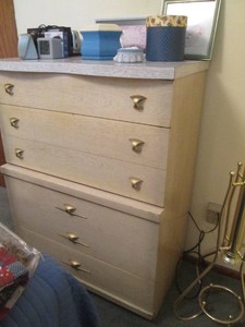Vintage dresser and its contents as shown