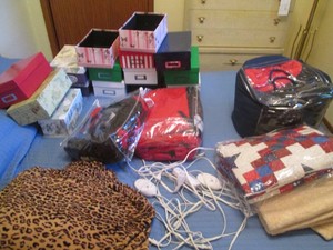 A collection of bedding and boxes