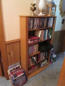 Bookshelf and its contents as shown