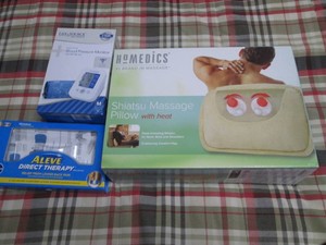 Blood pressure monitor, tens device and shiatsu massage pillow with heat