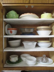 Decorative lidded pie plate, cake saver and lettuce dish, glass bowls, assorted Corelle dishes and more