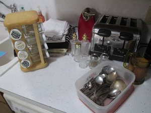 4-Slot stainless steel toaster, spinning spice rack, dish towels, glass spice shakers, electric can opener and more