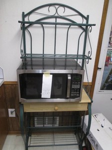 Dark Green Metal framed Bakers Rack with wood surface and drawer