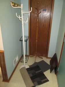 Pair of freestanding coat racks plus freestanding caneumbrella stand