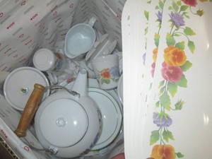 Floral Corningware dishes with place mats