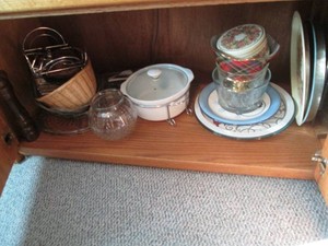 Variety of metal serving trays, glass bowls and more