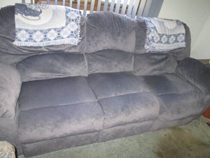 Navy Blue 3-cushion sofa with reclining ends and center console style bonus features plus matching decorative throw blankets