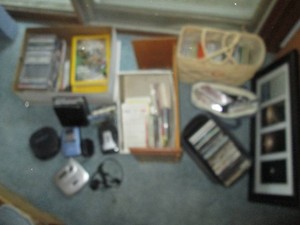 Large collection of music CDS, misc tape cassettes, media organizer and wall decor