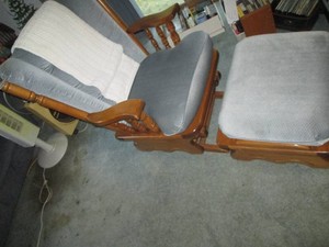 Cushioned Wood framed Glider rocking chair and ottoman with throw blanket