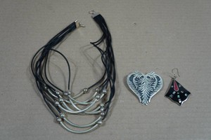 Leather and Silver Tone Necklace with Silver Pendants