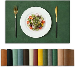 $22 Artoid Mode Green Faux Leather Placemats Set of 6, 12x18 Inch Waterproof Wipeable Heat Resistant Vinyl Place Mats, Reversible Table Mats for St. Patricks Day Dining Decor