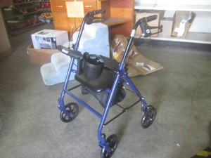 (FRNT) New Drive Four Wheel Rollator Mobility Chair with Hand Brakes, Padded Seat, Under Seat Storage, CupPhone Holder - Looks New  Unused