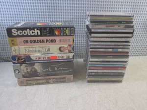 (F-1) Assorted CDs and VHS Movies